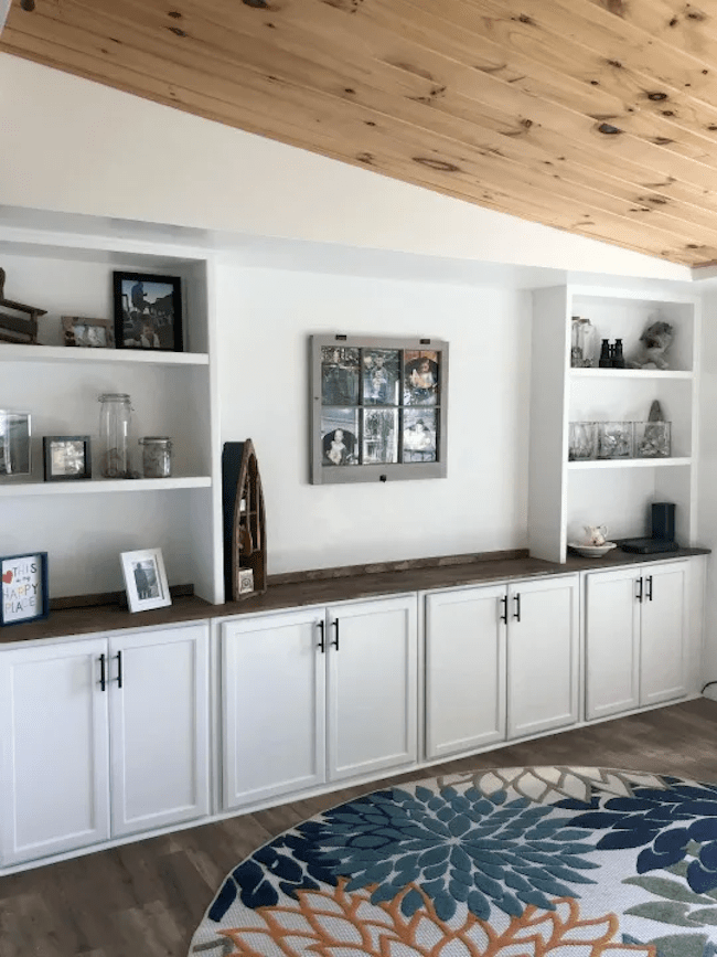 Built-in cabinets along a living room wall.