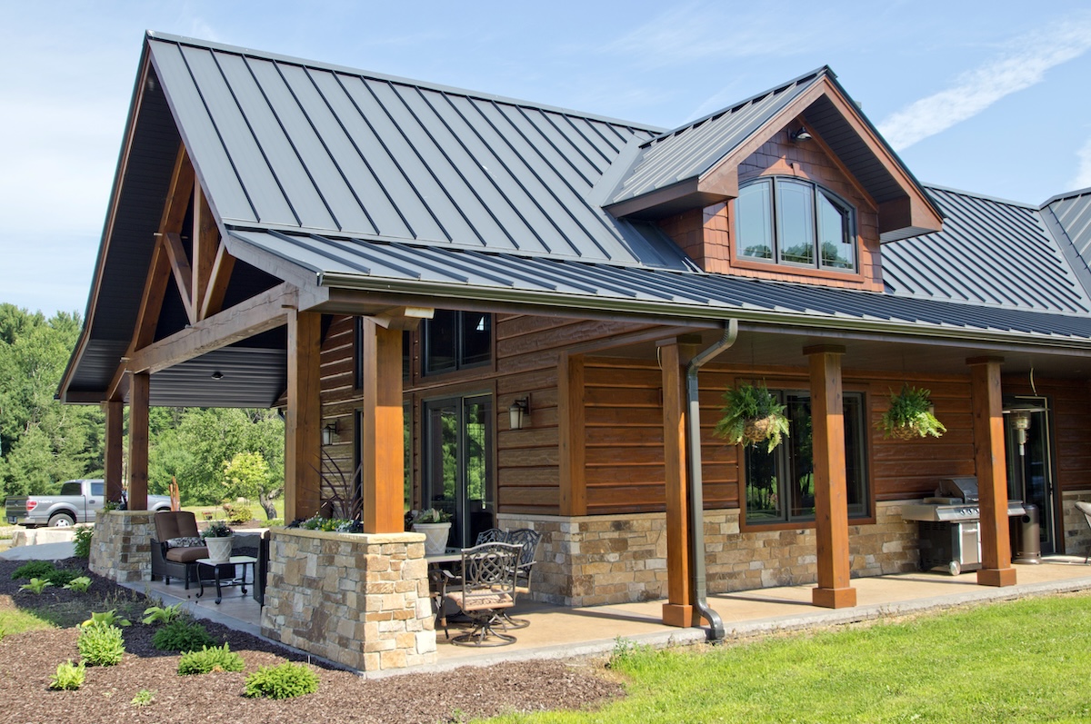 A residential home with a beautiful and durable metal roof.